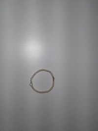 PULSEIRA PEROLA COM OURO 18K